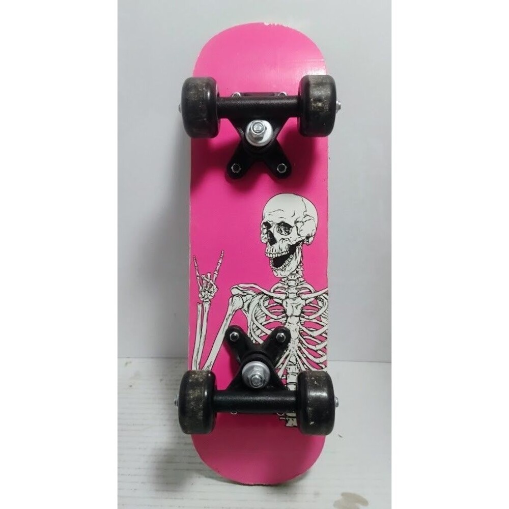 REBEL 17” MINI SKATEBOARD W MAGENTA & SKELETON GRAPHIC ON DECK